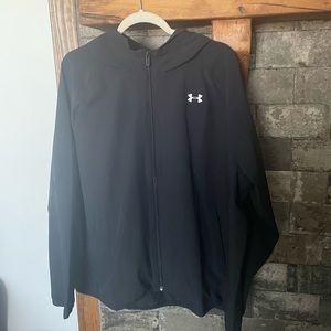 Under Armor waterproof rain jacket. New, never worn condition.